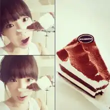 少女时代泰妍揽蛋糕卖萌图