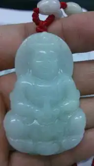 最近在购买了一块翡翠观音,有经验的人麻烦帮忙看一下,证书是翡翠a货,浅绿色,33.126克,放大检