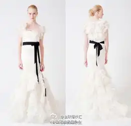 婚纱女王王薇薇的经典黑白婚纱作品,一副黑手套,一根黑腰带,就是verawang的时尚婚纱之道
