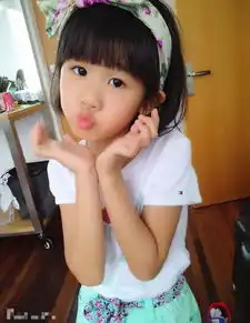 贝儿生日萌照曝光婴儿时期戴红发箍撅嘴